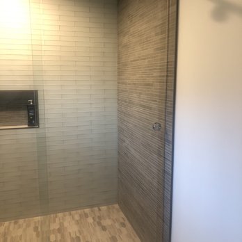 Go Frameless Enclosures - Opted for the circle handles to get better range on opening and closing the shower door. Plus they match the barn door rollers - Glass & Mirrors Near Me - Fullerton, California Go Frameless Enclosures - Opted for the circle handles to get better range on opening and closing the shower door. Plus they match the barn door rollers - Glass & Mirrors Near Me - Fullerton, California
