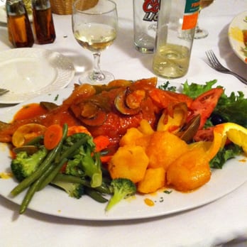 Omanel Restaurant - Red snapper with clams and shrimp. Excellent flavor! - Portuguese Near Me - Bridgeport, Connecticut