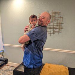 Amso Healthy Chiropractic - Dr. Amso working on our 3 month old :)