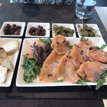 Rosso Intenso - Antipasti plate-Smoked salmon, goat cheeses, olives and capers - Italian Near Me - Fiumicino, RM Rosso Intenso - Antipasti plate-Smoked salmon, goat cheeses, olives and capers - Italian Near Me - Fiumicino, RM
