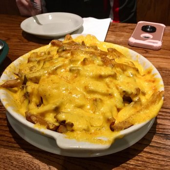Snuffer's Restaurant & Bar - Large cheese fries - American Near Me - Richardson, Texas Snuffer's Restaurant & Bar - Large cheese fries - American Near Me - Richardson, Texas