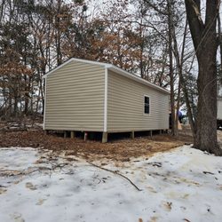 The Garage Guy - Rear view of shed built on pillars to keep level. Much nicer than sitting on blocks!