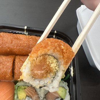 Sushi Q - Inside of spicy salmon crunch roll - Sushi Bars Near Me - Jacksonville, Florida Sushi Q - Inside of spicy salmon crunch roll - Sushi Bars Near Me - Jacksonville, Florida
