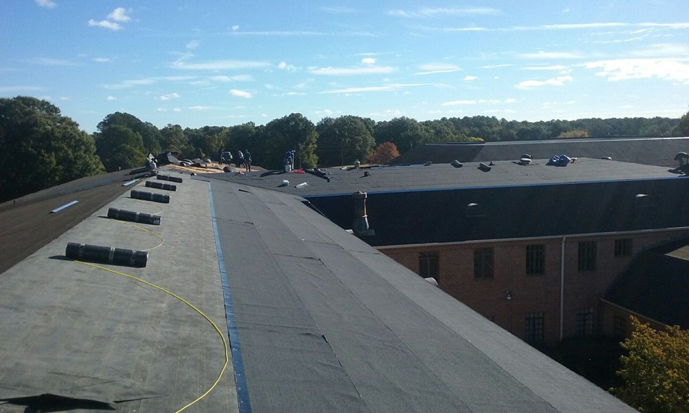 Slide of Tim's Roofing