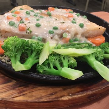 Big Skyy Bistro - Fish filet with white creamy sauce - Seafood Near Me - Riverside, California Big Skyy Bistro - Fish filet with white creamy sauce - Seafood Near Me - Riverside, California