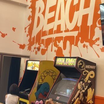 Proudly Serving - The games inside the restaurant - Burgers Near Me - Long Beach, California