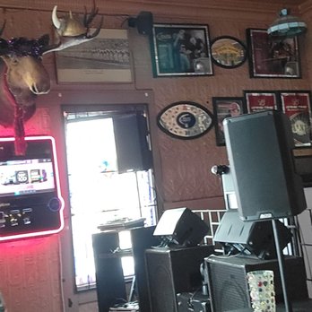 Antlers Tavern - a deer head mounted on the wall - Bars Near Me - Pinole, California