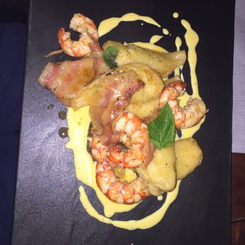 Tamerò - Sardinian pasta stuffed with with potatoes, mint and pecorino cheese salted with prawns bacon and salted custard - Italian Near Me - Florence, FI Tamerò - Sardinian pasta stuffed with with potatoes, mint and pecorino cheese salted with prawns bacon and salted custard - Italian Near Me - Florence, FI