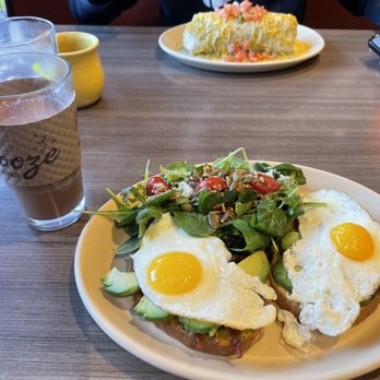 Snooze, an A.M. Eatery - bravocado toast, snooze breakfast burrito, and a chai latte - Breakfast & Brunch Near Me - Addison, Texas