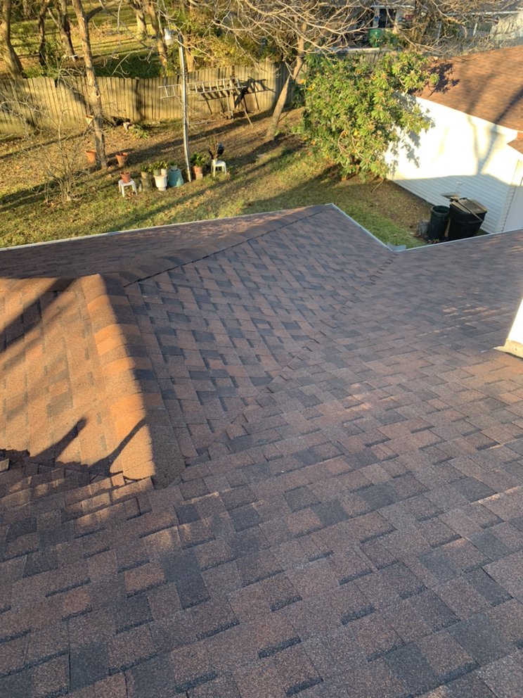 Slide of White Star Roofing