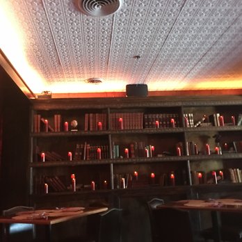 White Rabbit Gastropub - Cool bookshelf upstairs with lots of candles. - Gastropubs Near Me - Frederick, Maryland White Rabbit Gastropub - Cool bookshelf upstairs with lots of candles. - Gastropubs Near Me - Frederick, Maryland