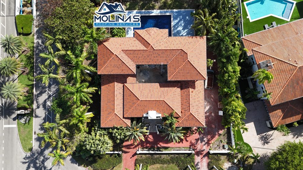Slide of Molina's Roofing Services