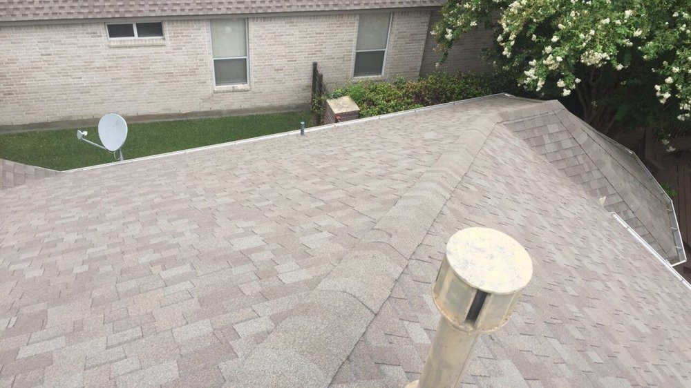 Slide of NSL Roofing Solutions