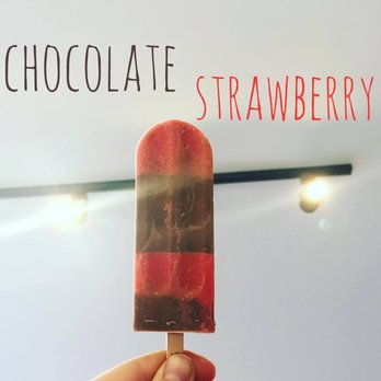 Frios Gourmet Pops - a hand holding a chocolate strawberry popsicle - Ice Cream & Frozen Yogurt Near Me - Chattanooga, Tennessee Frios Gourmet Pops - a hand holding a chocolate strawberry popsicle - Ice Cream & Frozen Yogurt Near Me - Chattanooga, Tennessee