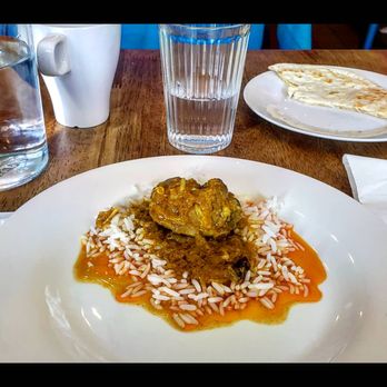 Korai Kitchen - Chicken Curry over White Basmati Rice. Cha Milk Tea. Paratha. - Bangladeshi Near Me - Jersey City, New Jersey