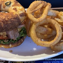 Outpost burger with onion rings