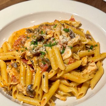 Tomatina - Pasta and Sauce*: Penne in tomato cream sauce with mushrooms, chicken and pancetta - Italian Near Me - Walnut Creek, California