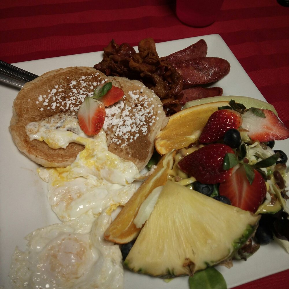 Karine's - Karine's supreme ($14) - pancakes, over easy eggs, bacon, sausage, salad with mustard dressing, and fruits - Breakfast & Brunch Near Me - Toronto, Ontario Karine's - Karine's supreme ($14) - pancakes, over easy eggs, bacon, sausage, salad with mustard dressing, and fruits - Breakfast & Brunch Near Me - Toronto, Ontario