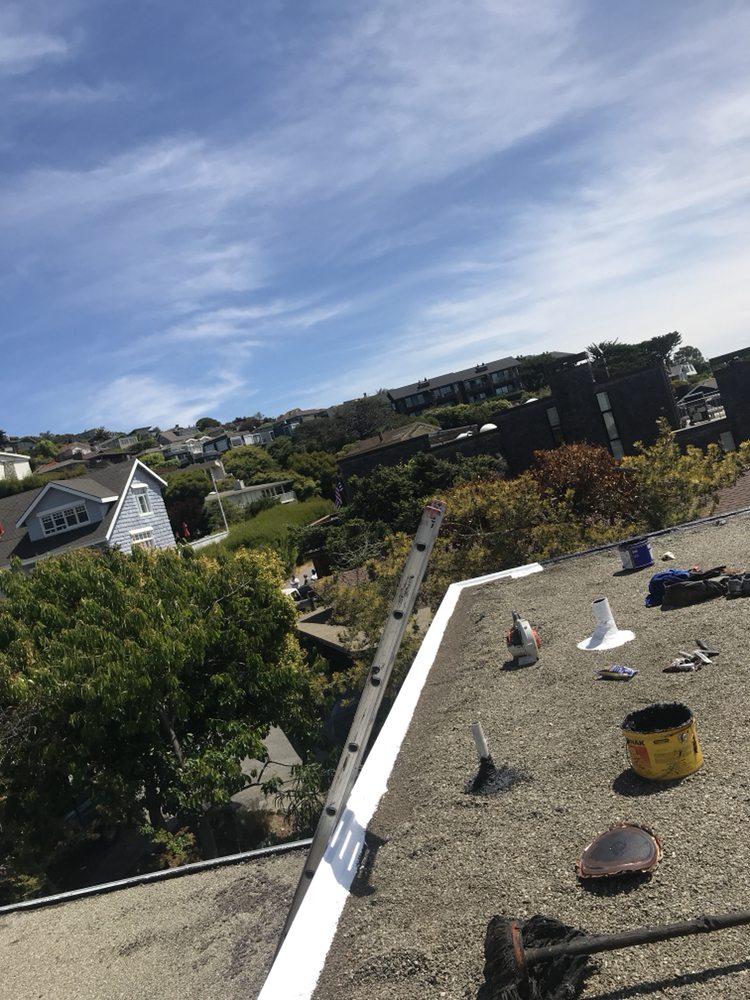 Slide of Francos Roofing