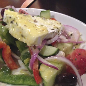 Taverna Kyma - Incredible Bulgarian Feta atop a Greek Salad of Cucumbers, Red Onion, Peppers, & Tomatoes in a, light Olive Oil, Oregano & Lime Dressing. - Greek Near Me - Boca Raton, Florida Taverna Kyma - Incredible Bulgarian Feta atop a Greek Salad of Cucumbers, Red Onion, Peppers, & Tomatoes in a, light Olive Oil, Oregano & Lime Dressing. - Greek Near Me - Boca Raton, Florida