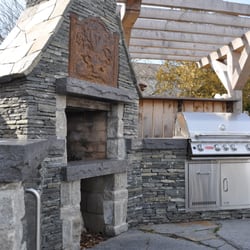 Waterscapes - Outdoor kitchen w/ Fire place