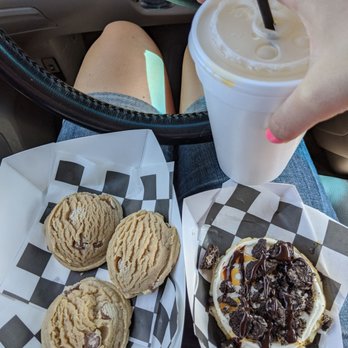 Twisted Sugar - a person sitting in a car with a cup of coffee and cookies - Desserts Near Me - Saratoga Springs, Utah Twisted Sugar - a person sitting in a car with a cup of coffee and cookies - Desserts Near Me - Saratoga Springs, Utah