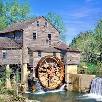 Old Mill Restaurant - The side view of the mill and the mini waterfall. - American Near Me - Pigeon Forge, Tennessee Old Mill Restaurant - The side view of the mill and the mini waterfall. - American Near Me - Pigeon Forge, Tennessee