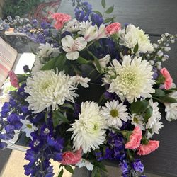 Wild Blooms Florals - This was a biodegradable wreath for my cousins memorial. This beautiful arrangement went out to sea with my cousins ashes.