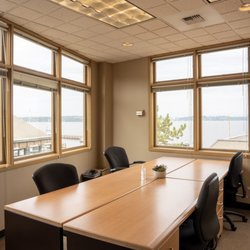extraSlice - Office Space Simplified - Office suite with four desks overlooking Lake Washington.