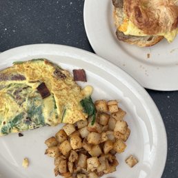 Omelette with potatoes, croissant Breakfast Sandwich Omelette with potatoes, croissant Breakfast Sandwich