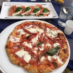 Limoncello di Capri - Spicy salami pizza and caprese salad.