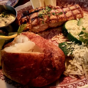 Clementine's Steak House - Grilled salmon with the famous baked potato. - Steakhouses Near Me - Carpinteria, California Clementine's Steak House - Grilled salmon with the famous baked potato. - Steakhouses Near Me - Carpinteria, California