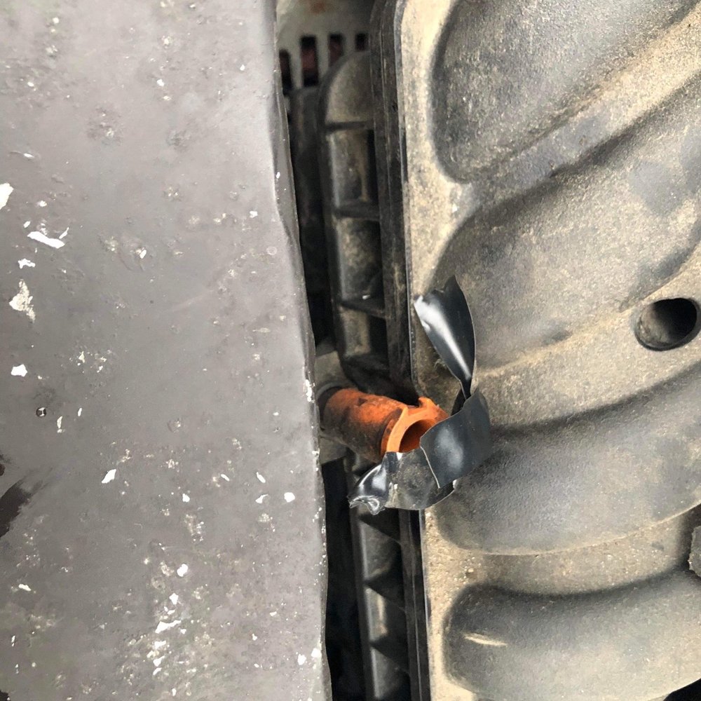 Windy City Muffler & Brakes - Electric tape over oil spot - Auto Repair Near Me - Chicago, Illinois Windy City Muffler & Brakes - Electric tape over oil spot - Auto Repair Near Me - Chicago, Illinois