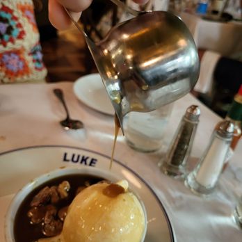 Luke - Brendan's Bread Pudding ($12.00) hot buttered rum sauce, candied pecans, vanilla bean ice cream. - French Near Me - New Orleans, Louisiana Luke - Brendan's Bread Pudding ($12.00) hot buttered rum sauce, candied pecans, vanilla bean ice cream. - French Near Me - New Orleans, Louisiana