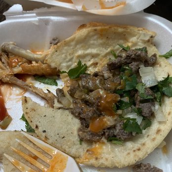 Jacintos Kitchen - a plate of tacos and a fork - Mexican Near Me - West Palm Beach, Florida