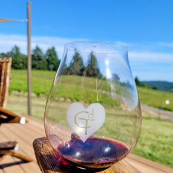 Coeur de Terre Vineyard - Wine glass holders in the patio chairs!