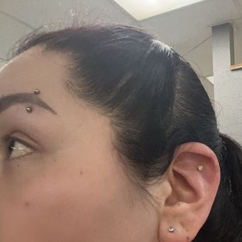 Envision Tattoo - Eye brow jewelry change and flat piercing - Tattoo Near Me - Grand Terrace, California Envision Tattoo - Eye brow jewelry change and flat piercing - Tattoo Near Me - Grand Terrace, California
