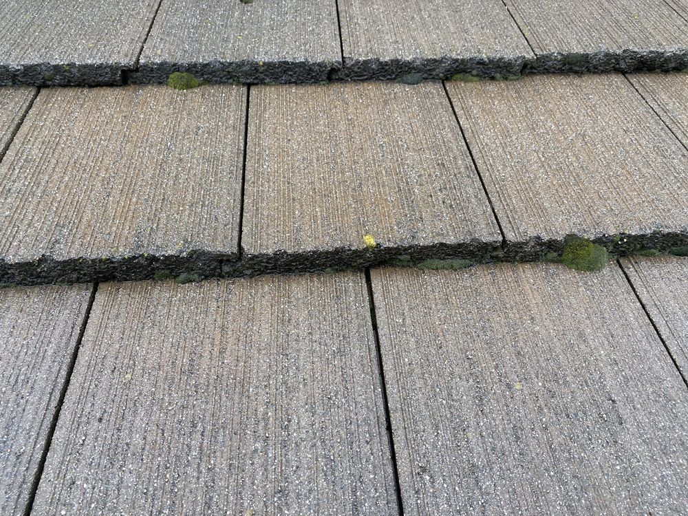 Slide of Valentine Roofing