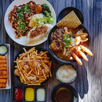 19 GOLD - The whole spread: 19 Gold Fries + Deep Fried Golden Bun w/ Condensed Milk + Surf & Turf + Pork Belly with Sweet Garlic Sauce over Rice⁣ - Taiwanese Near Me - Seattle, Washington