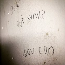Nashoba Valley Auto School - graffiti seen in classroom: "get out while you can"