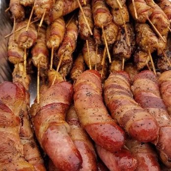 Ross Mountain BBQ & Catering - (Back)-bacon wrapped chicken skewer and bacon wrapped brat. Credit: Ross Mountain BBQ Facebook page. - Barbeque Near Me - Sherrodsville, Ohio Ross Mountain BBQ & Catering - (Back)-bacon wrapped chicken skewer and bacon wrapped brat. Credit: Ross Mountain BBQ Facebook page. - Barbeque Near Me - Sherrodsville, Ohio