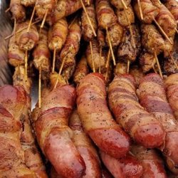 Ross Mountain BBQ & Catering - (Back)-bacon wrapped chicken skewer and bacon wrapped brat. Credit: Ross Mountain BBQ Facebook page.