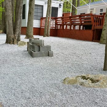 A & J Lawn Care - a graveled area with rocks and trees - Tree Services Near Me - Spring Brook Township, Pennsylvania A & J Lawn Care - a graveled area with rocks and trees - Tree Services Near Me - Spring Brook Township, Pennsylvania