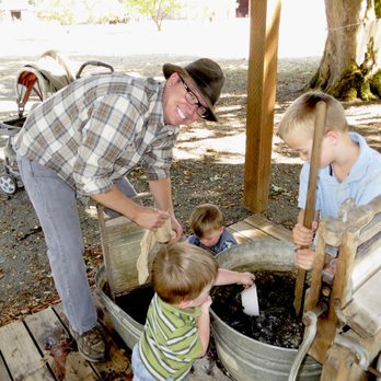 Philip Foster Farm - Me with my sons learning how to manually wash clothes in the 1800s. - Museums Near Me - Eagle Creek, Oregon Philip Foster Farm - Me with my sons learning how to manually wash clothes in the 1800s. - Museums Near Me - Eagle Creek, Oregon