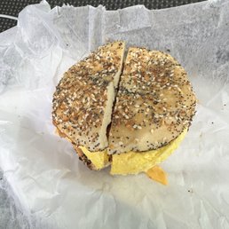 Bacon egg and cheese on an everything bagel Bacon egg and cheese on an everything bagel