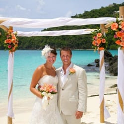 Ceremonies of St. John - Flowers and a bamboo canopy make the perfect altar location on the beach.