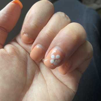 Kuhio Nails & Spa - My "Hawaiian flower" that I chose from their examples of nail art they offer. Not worth $5. - Nail Salons Near Me - Honolulu, Hawaii Kuhio Nails & Spa - My "Hawaiian flower" that I chose from their examples of nail art they offer. Not worth $5. - Nail Salons Near Me - Honolulu, Hawaii