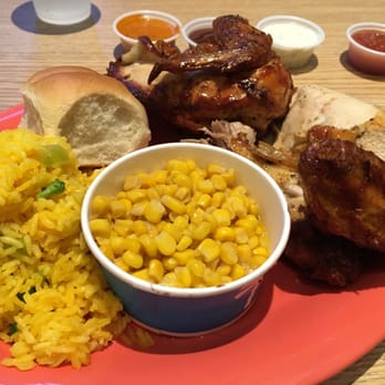 Pollo Tropical - 1/2 chicken, all white meat, plus two sides & bread. $7.79. - Latin American Near Me - Orlando, Florida Pollo Tropical - 1/2 chicken, all white meat, plus two sides & bread. $7.79. - Latin American Near Me - Orlando, Florida