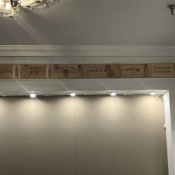 Cork and Table - Nice wood planks of wines in the restaurant - Wine Bars Near Me - Fredericksburg, Virginia
