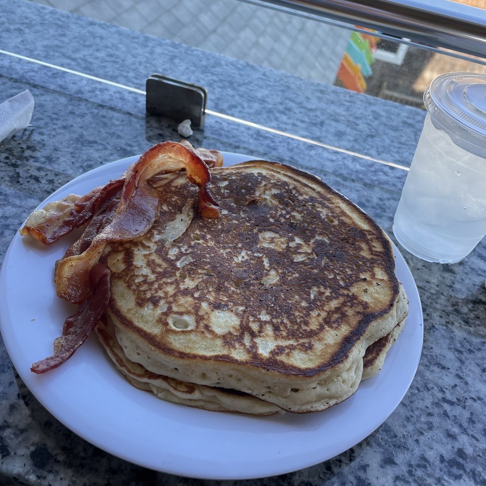 The Bite At The Box - a stack of pancakes and bacon - Breakfast & Brunch Near Me - Atlantic Beach, North Carolina The Bite At The Box - a stack of pancakes and bacon - Breakfast & Brunch Near Me - Atlantic Beach, North Carolina